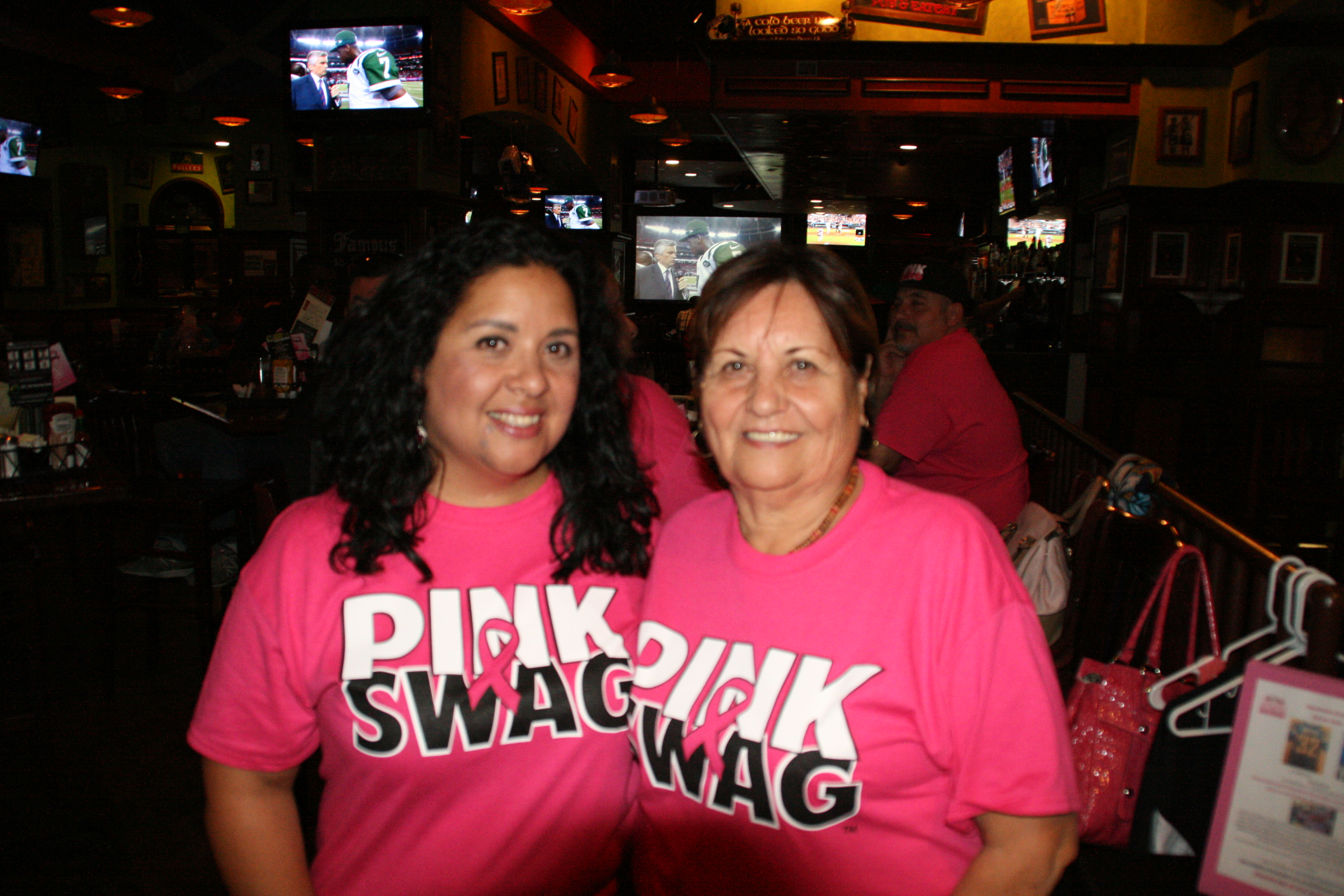 Ysabel and a friend in matching Pink Swag shirts